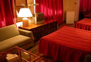 Comfort double with city view, king bed, private facilities (bath and shower), and breakfast